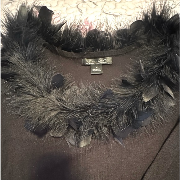 Party sweater w/ black feather collar making the perfect frame for your smile - Picture 2 of 7